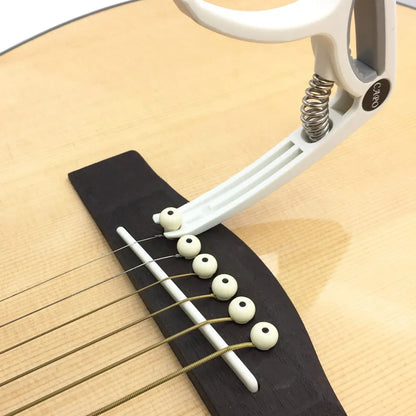 SLOZZ Plastic Guitar Capo - Tuning Clamp for 6 String Acoustic, Classic, and Electric Guitars, Musical Instrument Accessories